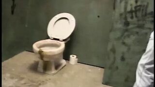 Fair-haired hottie likes to clean the bald dude's pipe through gloryhole and gets nailed in toilet - 1 image