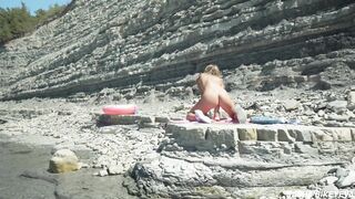 Awesome kinky nudist girl in sunglasses sucks & rides a huge dildo in public beach - Sasha Bikeyeva - 13 image