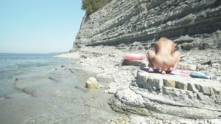 Awesome kinky nudist girl in sunglasses sucks & rides a huge dildo in public beach - Sasha Bikeyeva - 14 image