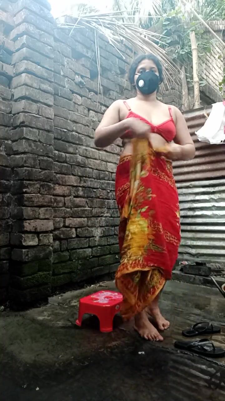 Shower scene of Bangladeshi village girl akhi looking beautiful with sexy dress image image