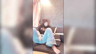 Cute woman masturbating while watching a pornographic video