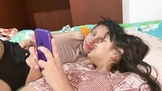 while we are checking the cell phone lying with my stepsister I ask her if she has been with a woman and so I teach her