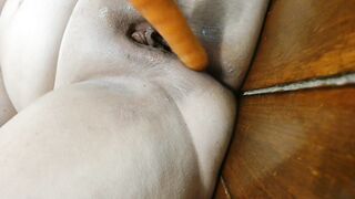 Carrot masturbating pussy leads to creamy mess and orgasm - 4 image