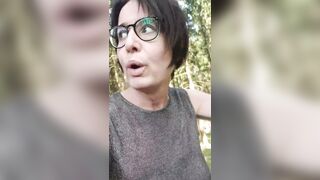 Splashing naked in the forest and going topless