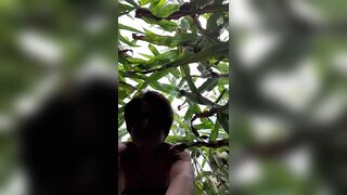 Julie strips naked and sprays in the cornfield - 2 image