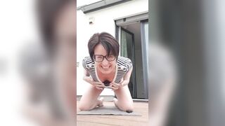 Milf Julie squirts with weight on labia - 1 image