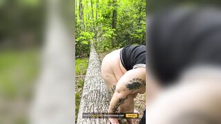 Sucking on a Straw in the Woods Squirting on Tree on Her Knees - 9 image