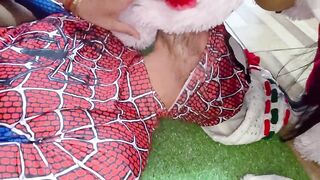 Watch two stunning stepsisters pleasure Spidey with a hot threesome at Christmas