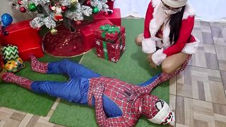 Watch two stunning stepsisters pleasure Spidey with a hot threesome at Christmas