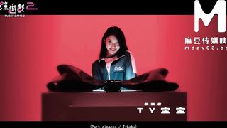 Asian babe Asia's short hair blows while she squirts in a parody game with toys