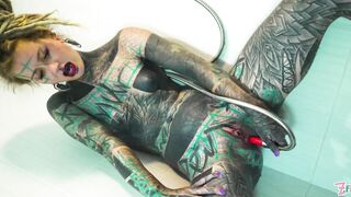 Petite tattooed model squirts while fingering her tight ass in the shower